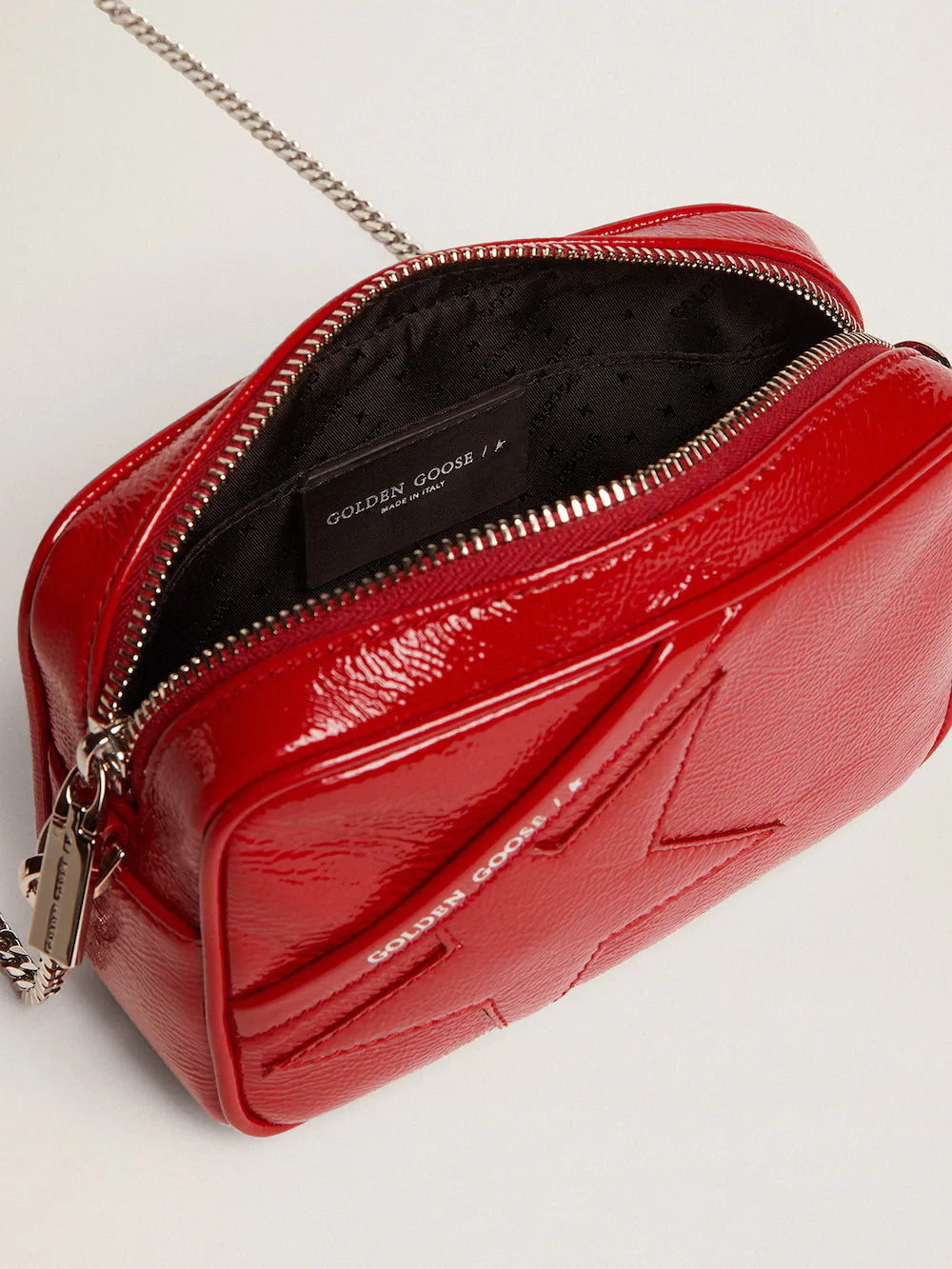 Bolso Mini Star para mujer de piel pintada de rojo con estrella tono sobre tono