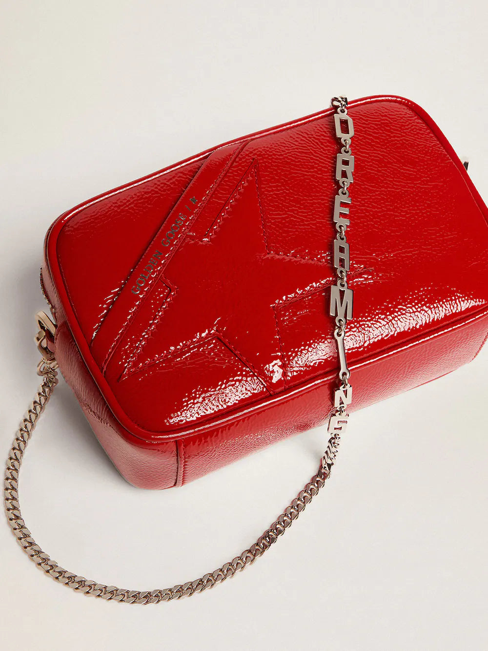 Women's Mini Star Bag in red painted leather with tone-on-tone star