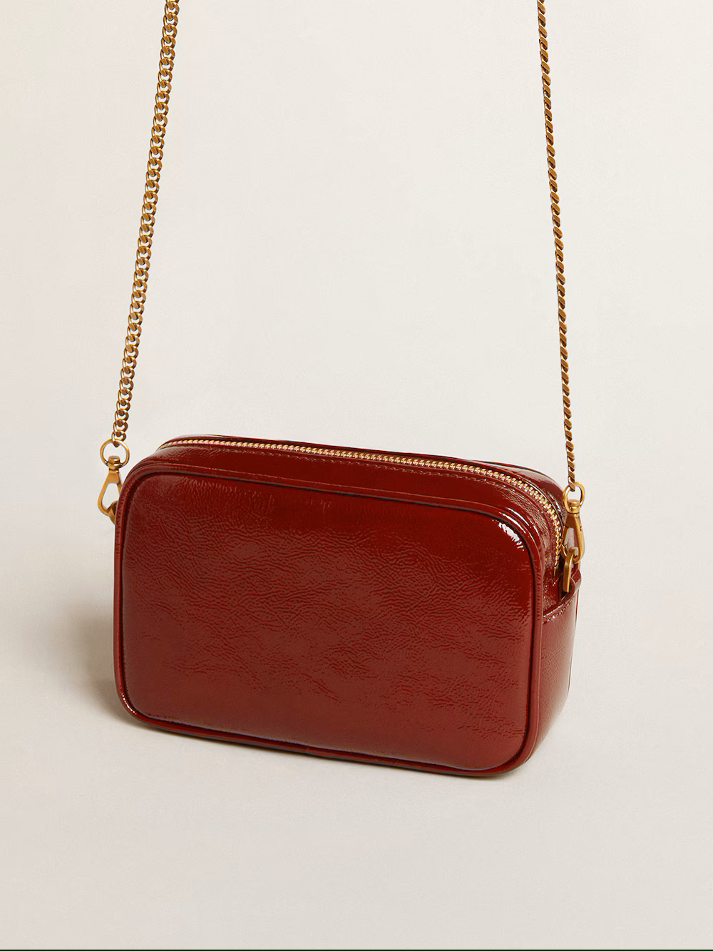 Mini Star Bag in vernice bordeaux con stella tono su tono