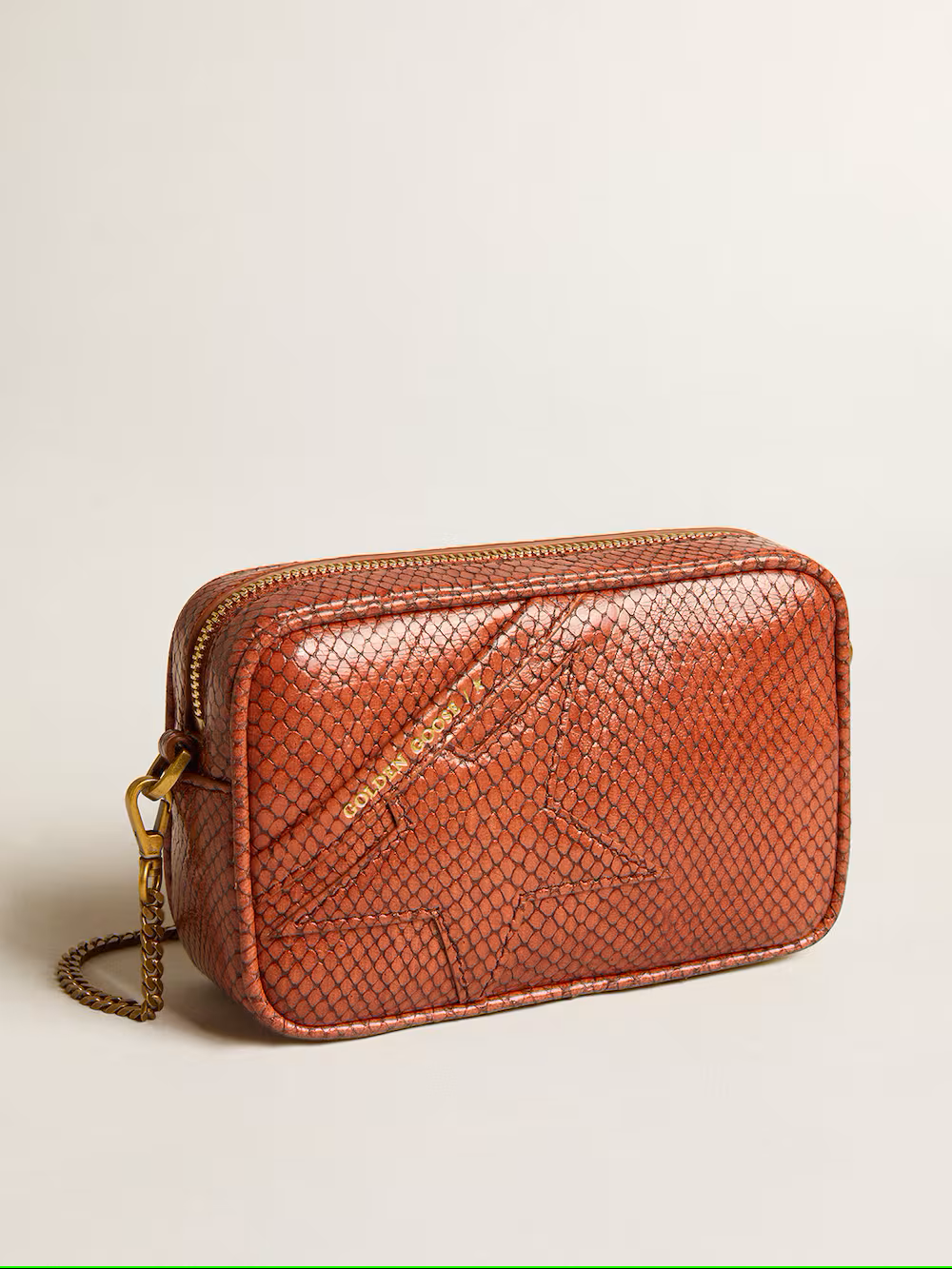 Mini Star Bag in rust-colored snake-print leather