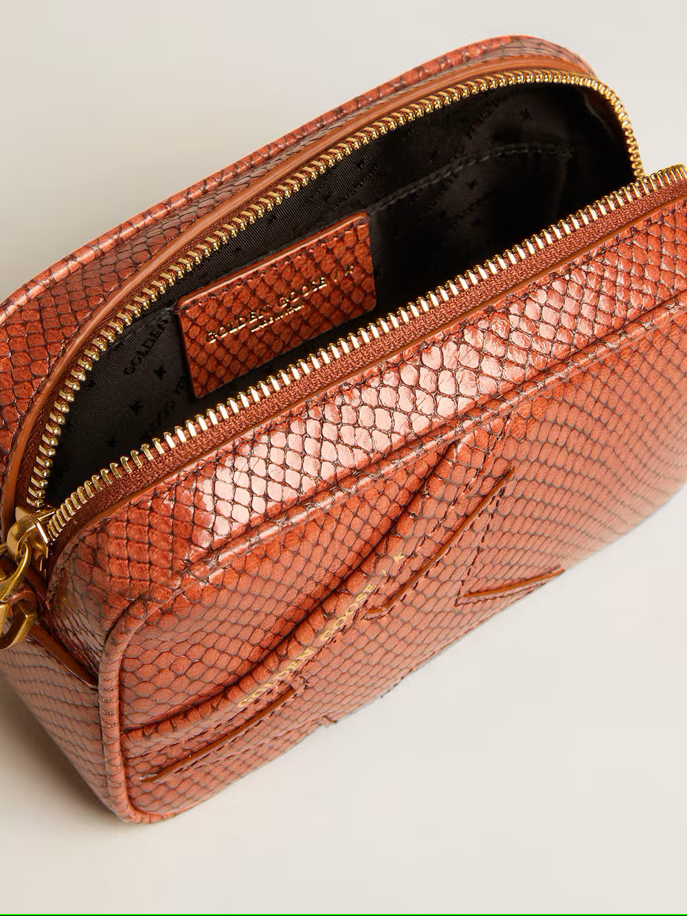 Mini Star Bag in rust-colored snake-print leather