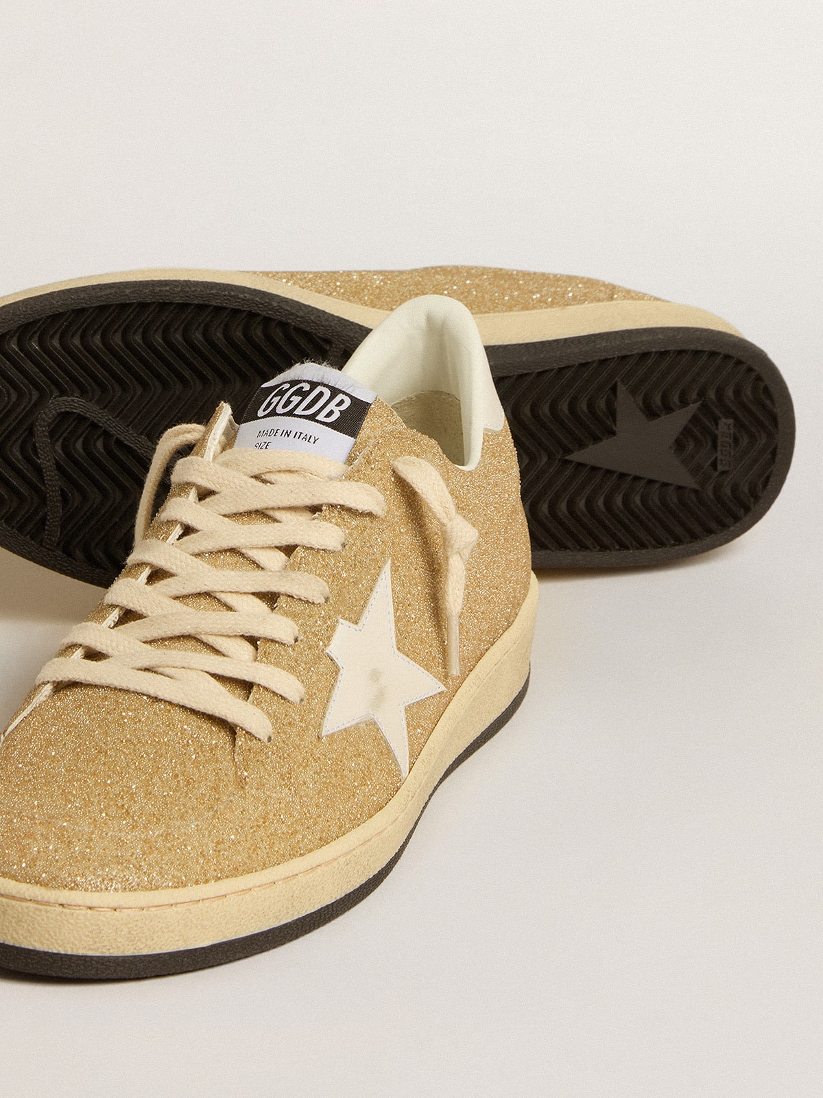 Ball Star in golden Swarovski crystals with milk-white leather star