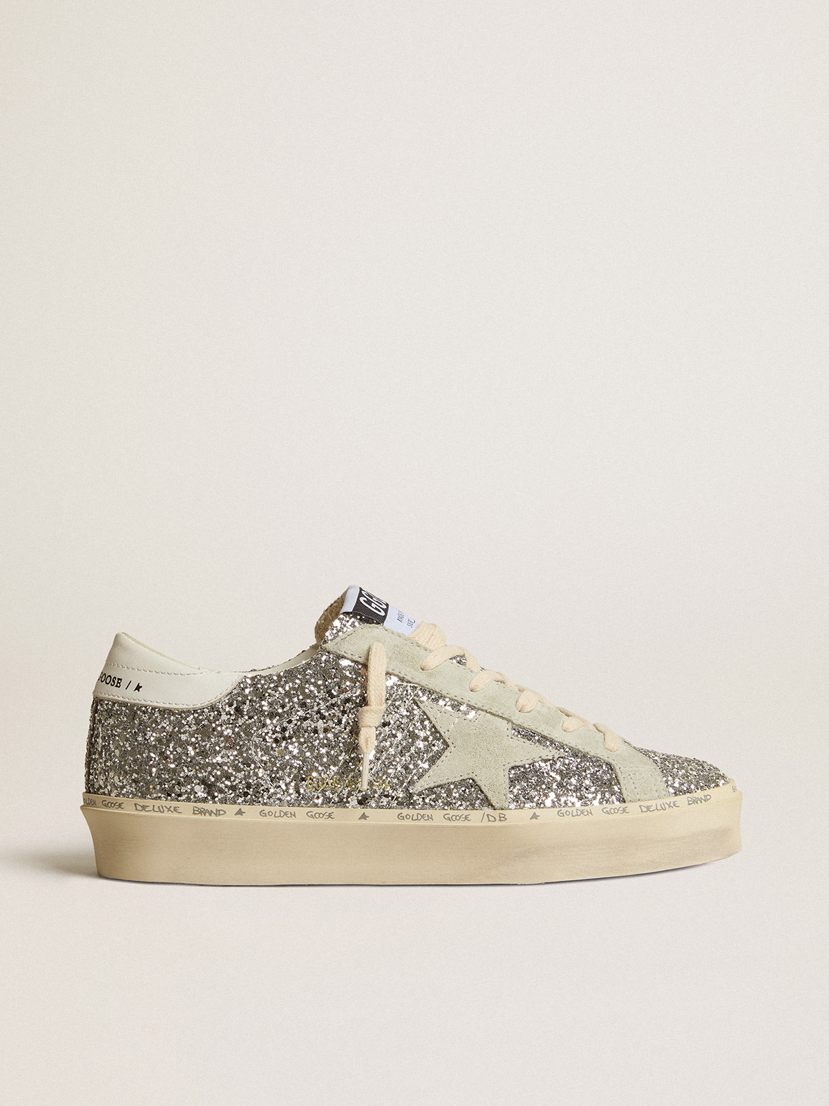 Hi Star in glitter argento con stella in suede e linguetta bianca sul tallone