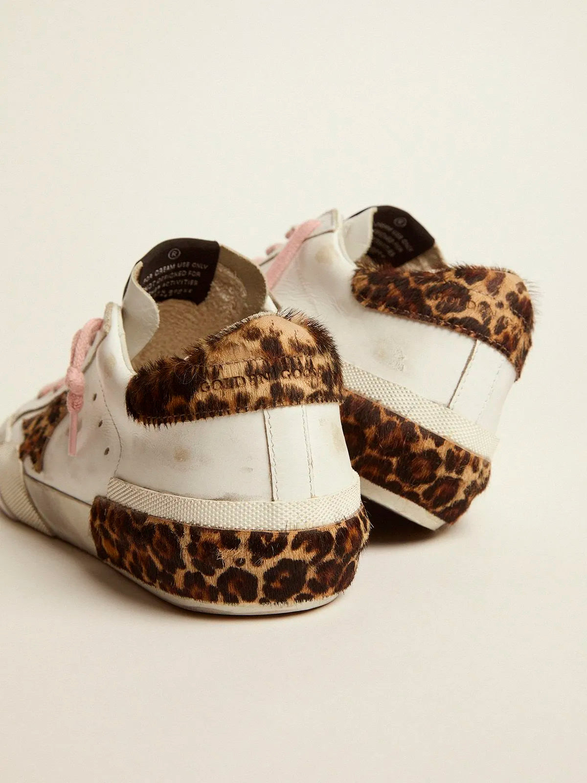 Deportivas Super-Star de piel blanca con detalles y multifoxing de piel de potro con estampado de leopardo 