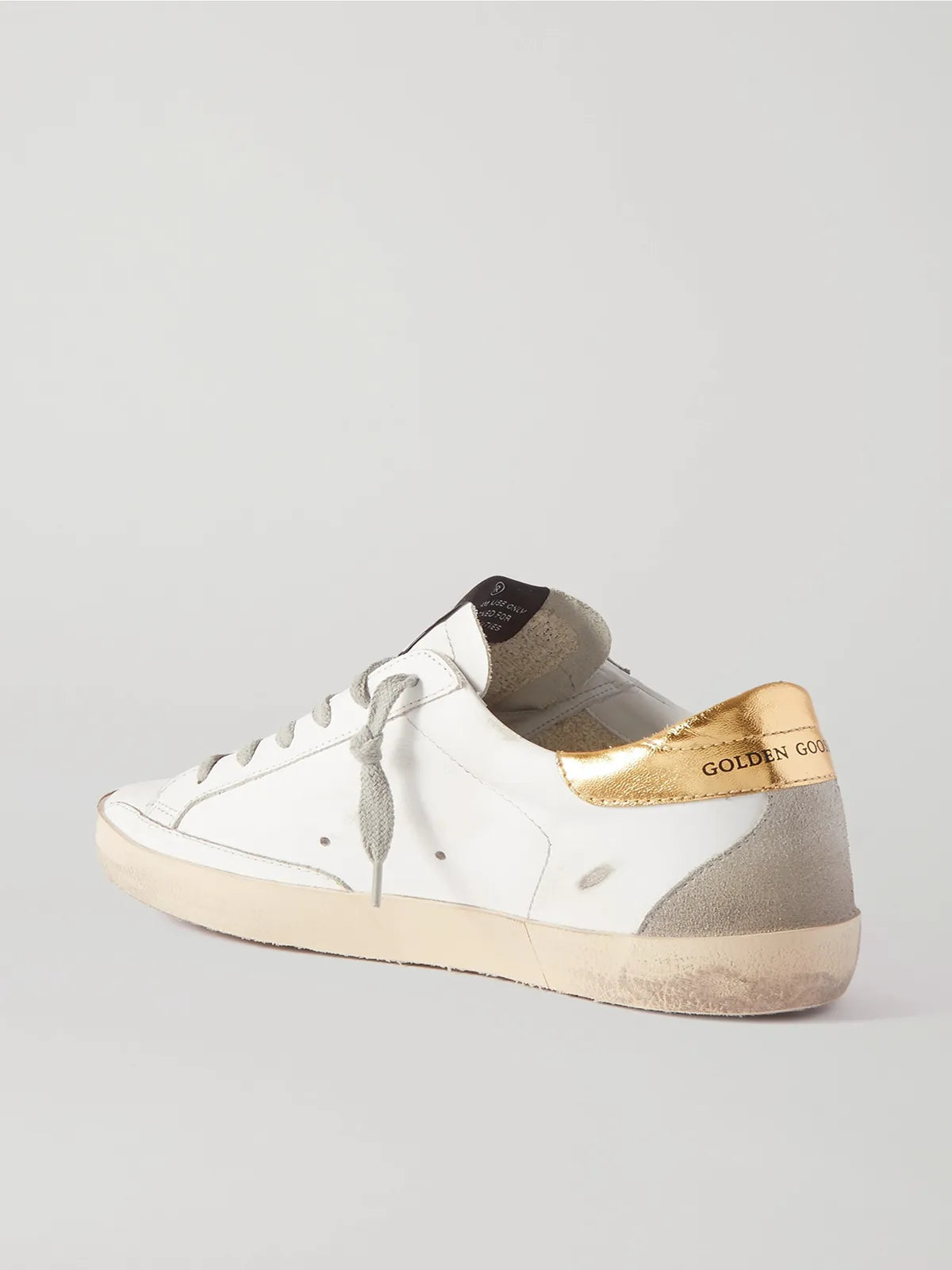 Superstar distressed leather and suede sneakers