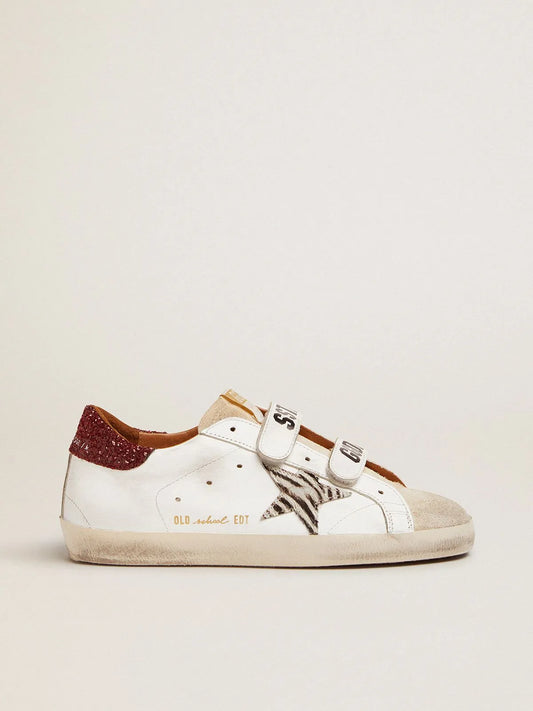 Old-School-Sneaker mit Ponyfell-Stern im Zebra-Print und rot glitzernder Fersenlasche