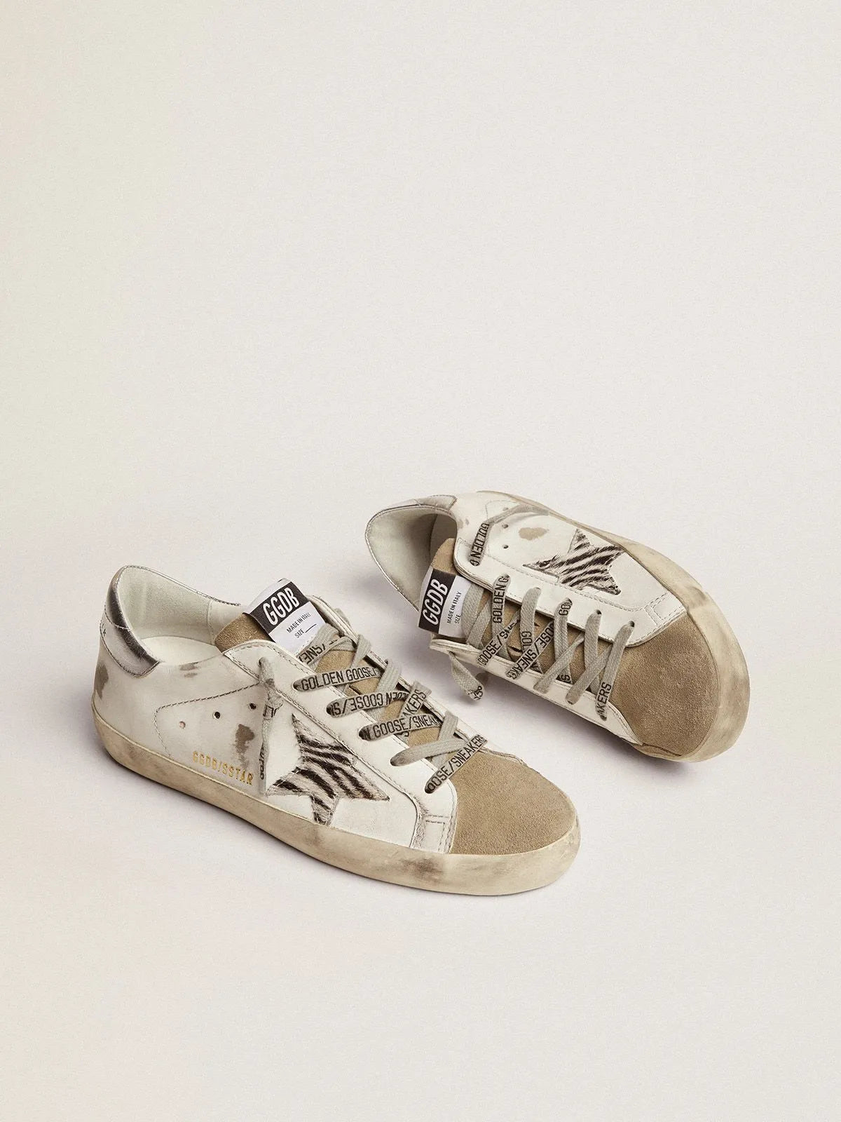 Super-Star sneakers with silver laminated leather heel tab and zebra-print pony skin star