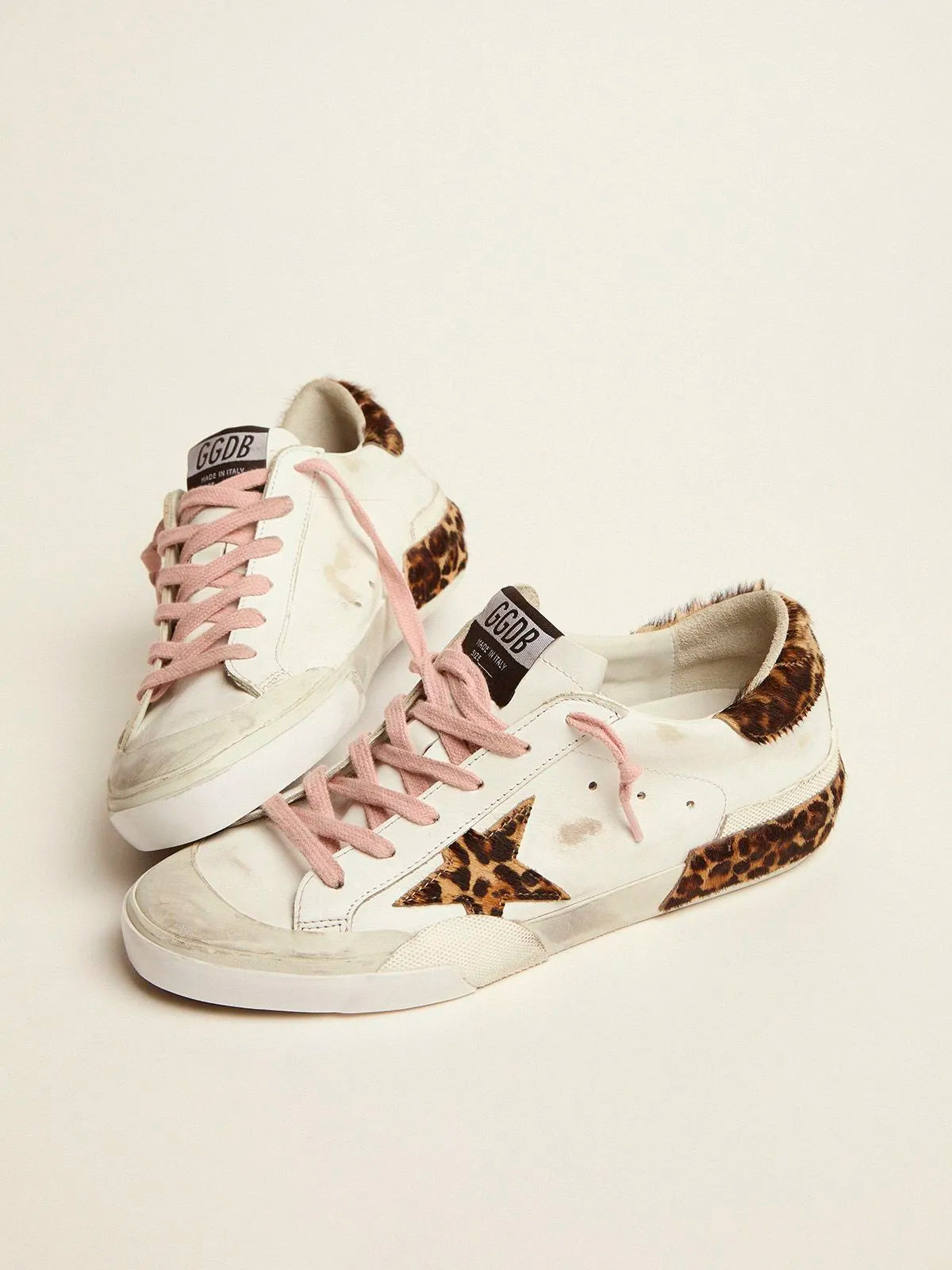 Deportivas Super-Star de piel blanca con detalles y multifoxing de piel de potro con estampado de leopardo 