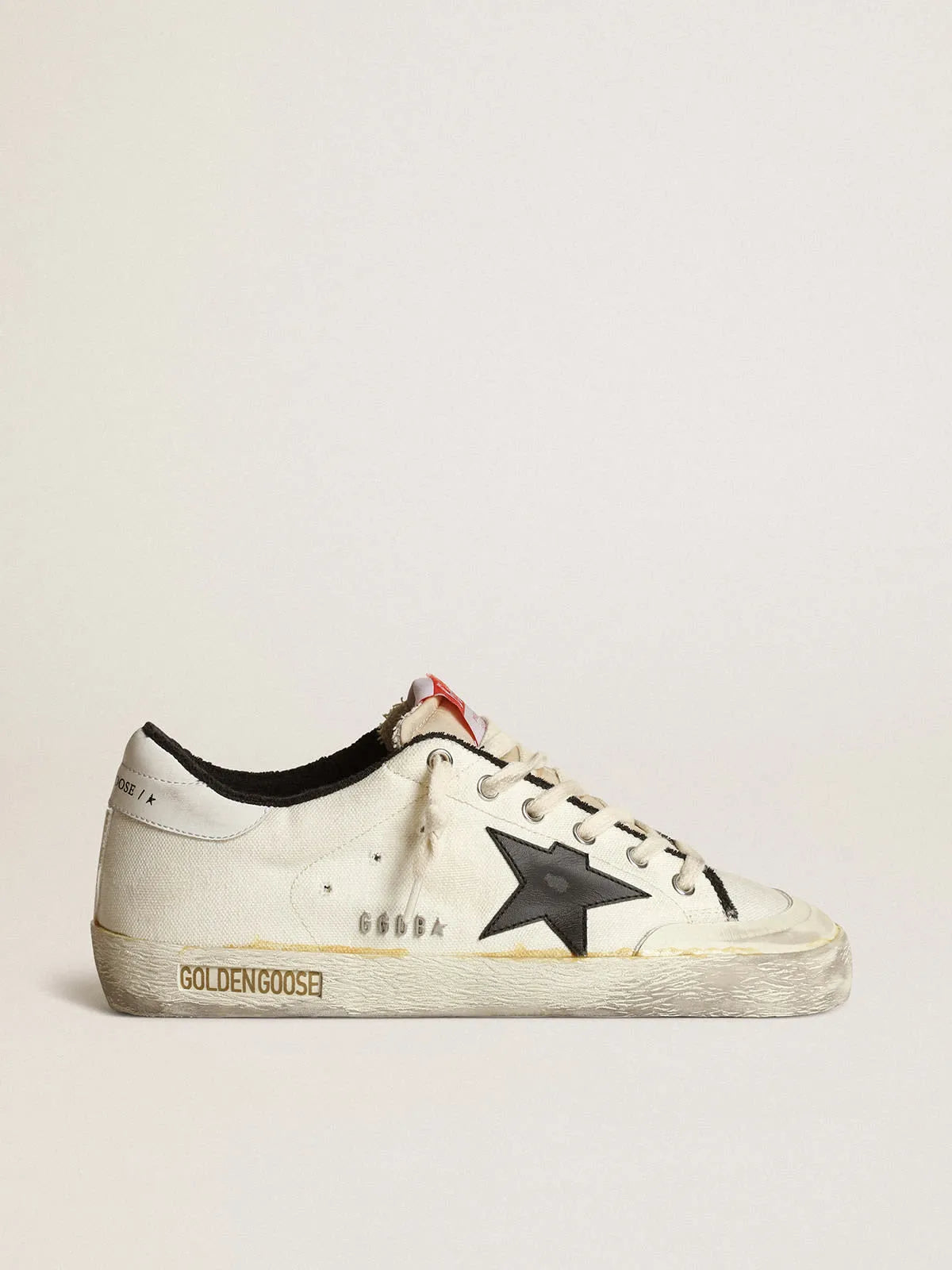 Damen-Sneaker Super-Star LTD aus beigem Canvas mit schwarzem Lederstern und weißer Lederfersenlasche