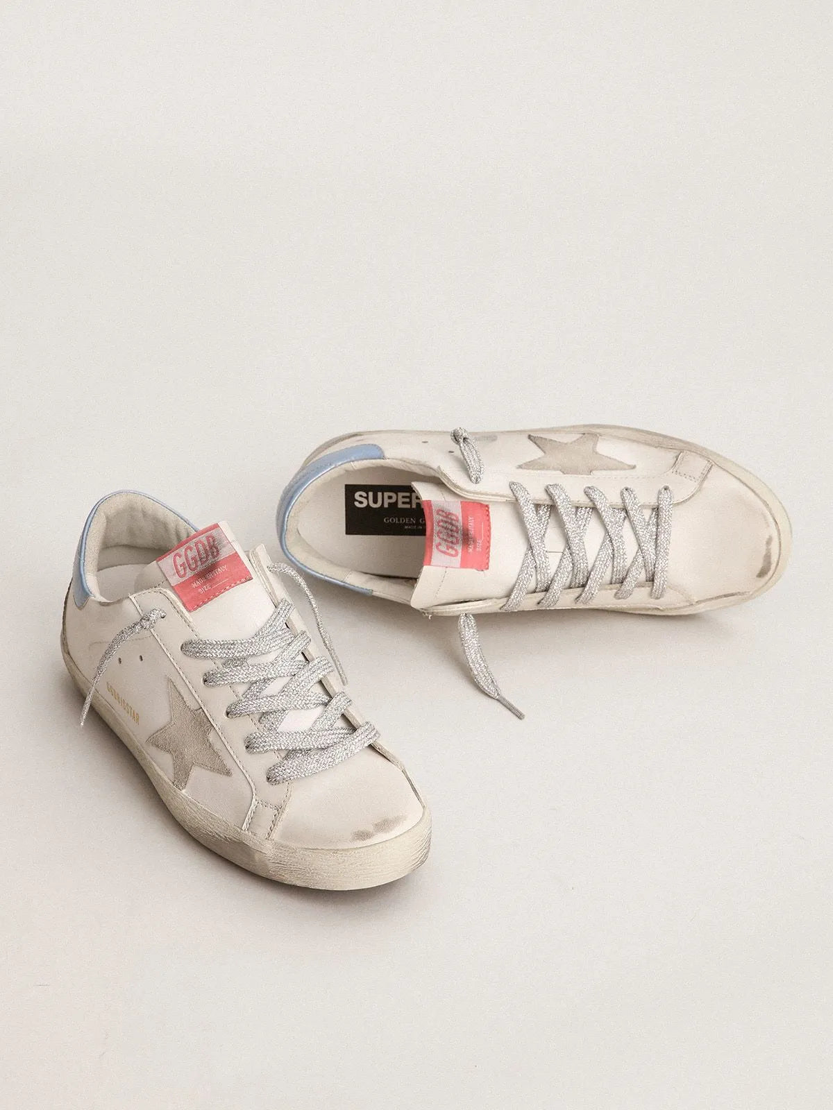 Super-Star sneakers with sky-blue laminated leather heel tab and ice-gray suede star