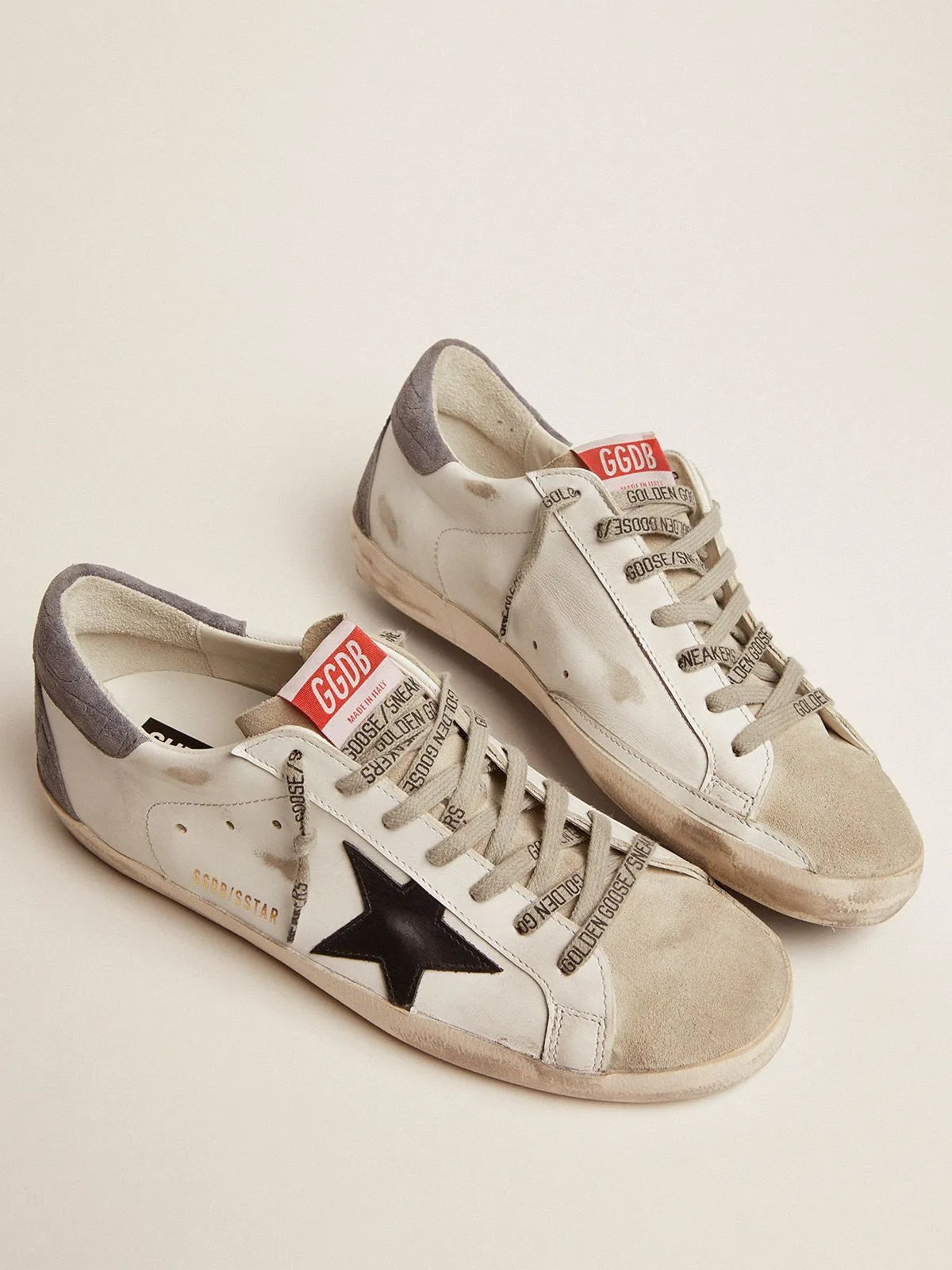 Super-Star LTD sneakers with black leather star and gray crocodile-print suede heel tab