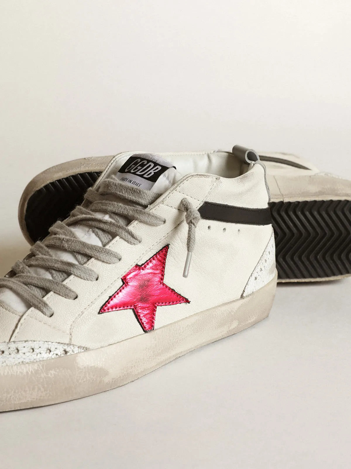 Mid Star with a pink laminated leather star and black flash