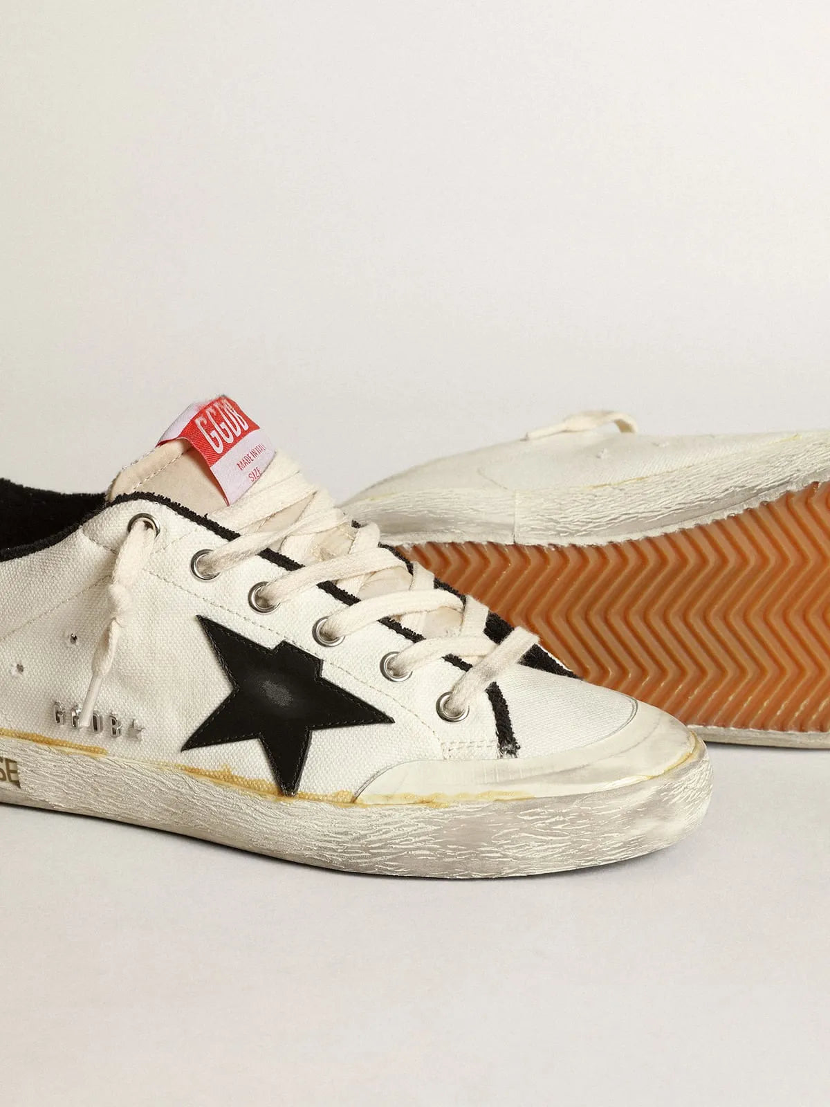 Damen-Sneaker Super-Star LTD aus beigem Canvas mit schwarzem Lederstern und weißer Lederfersenlasche