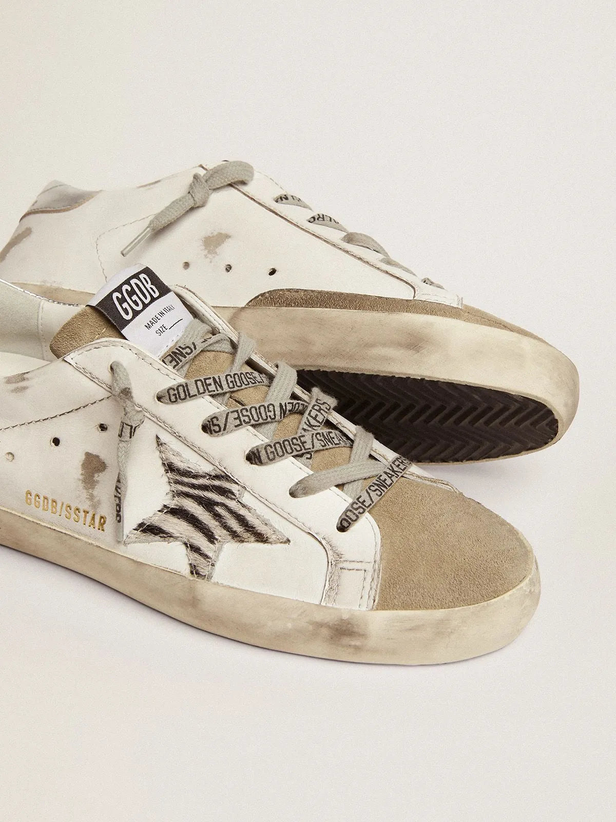 Super-Star sneakers with silver laminated leather heel tab and zebra-print pony skin star