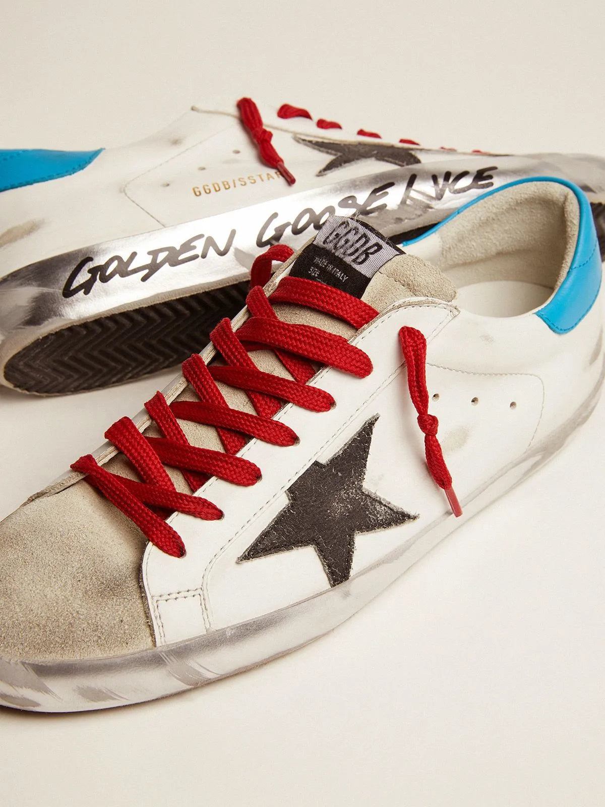 Super-Star LTD sneakers with light blue heel tab and black crackle leather star