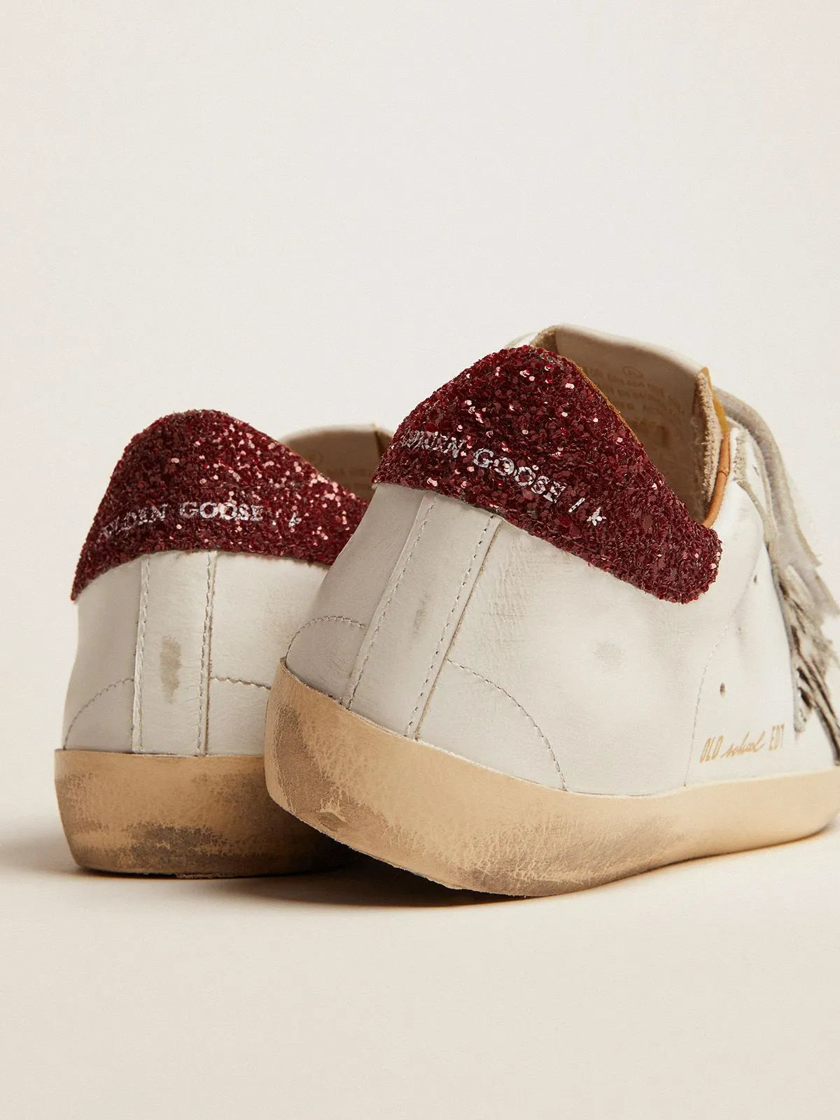 Old School sneakers with zebra-print pony skin star and red glitter heel tab