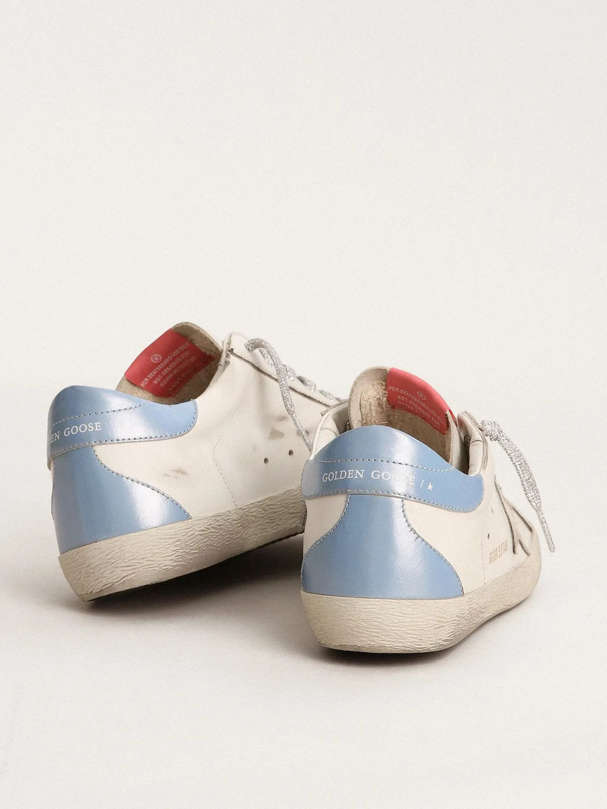 Super-Star sneakers with sky-blue laminated leather heel tab and ice-gray suede star